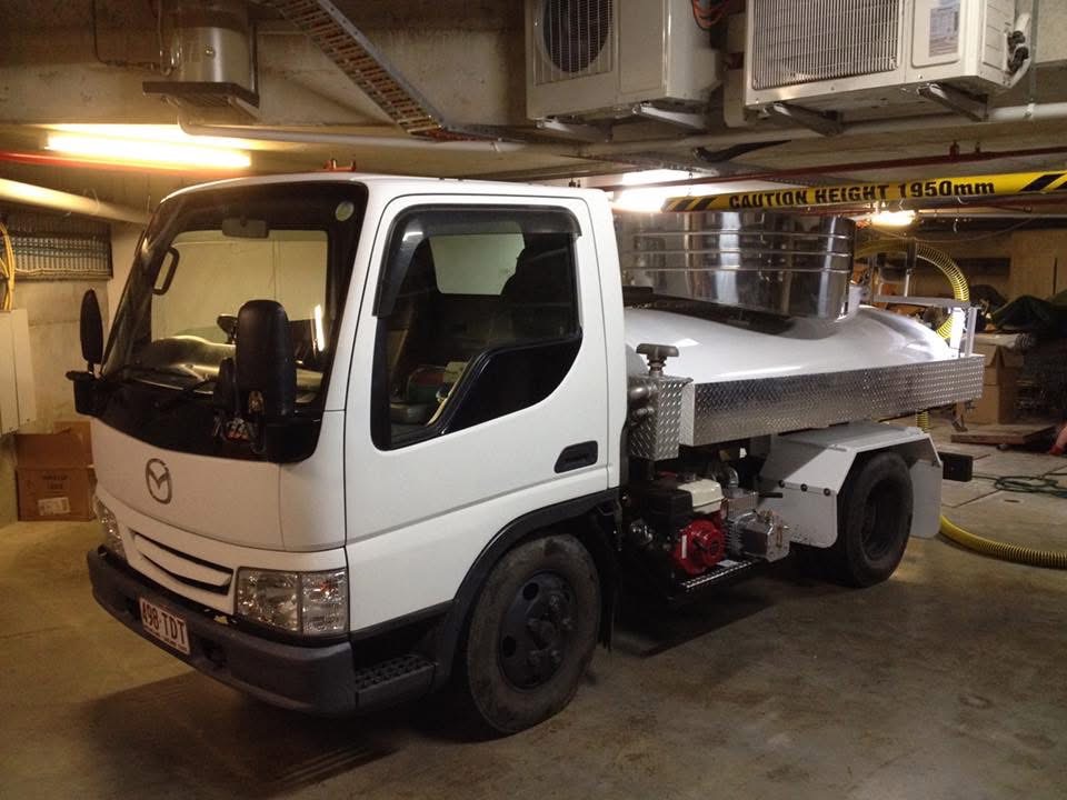 Compact vacuum truck working beneath a low basement ceiling
