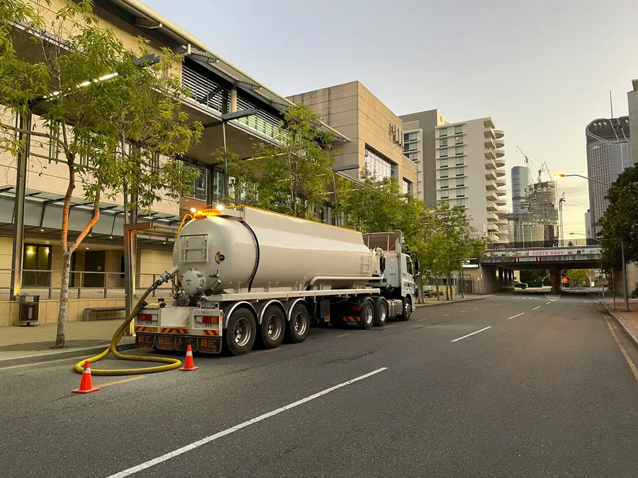 Pump-It vacuum tanker collecting liquid waste from a commercial building in South Bank, Brisbane